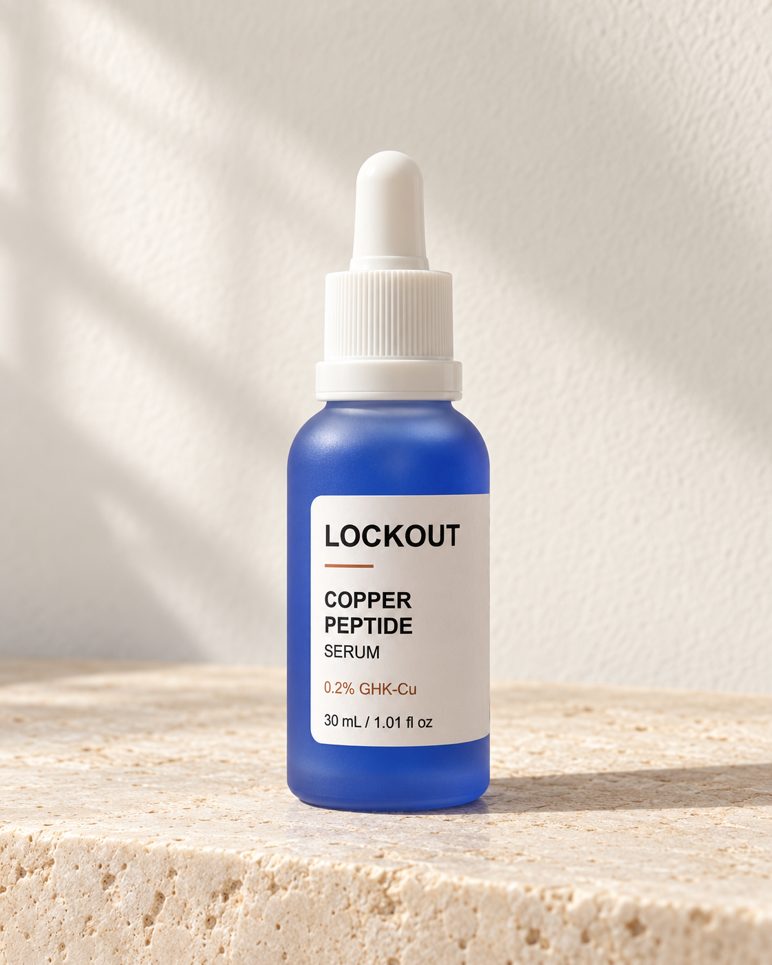 Lockout copper peptide serum on limestone. Retouched product photo.